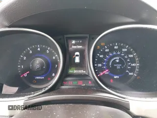 2014 Hyundai Santa Fe with VIN 5XYZU3LB9EG229255, listed as a IAAI auction lot 42407410 with 201,523 mi miles and . Bid and sale history available at DreamBid. Image 7.