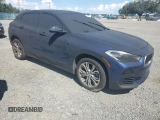 2021 BMW X2 sDrive28i with VIN WBXYH9C01M5T07944, listed as a Copart auction lot 73800944 with 0 mi miles and Salvage Title. Bid and sale history available at carsss.com. Image 4.