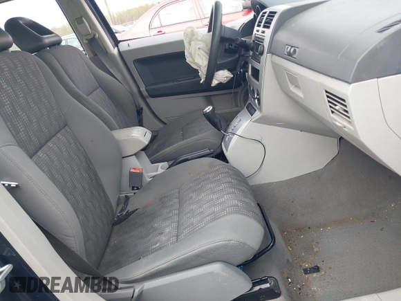 2007 Dodge Caliber with VIN 1B3HB28B17D350160, listed as a IAAI auction lot 41988479 with 174,949 mi miles. Bid and sale history available at carsss.com. Image 5.