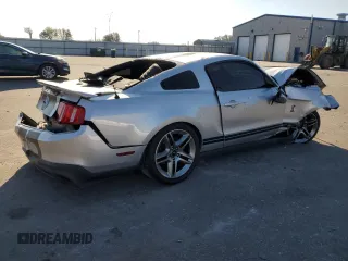 2010 Ford Mustang GT500 with VIN 1ZVBP8JS3A5156425, listed as a Copart auction lot 77348134 with 61,984 mi miles and Salvage title. Bid and sale history available at DreamBid. Image 3.