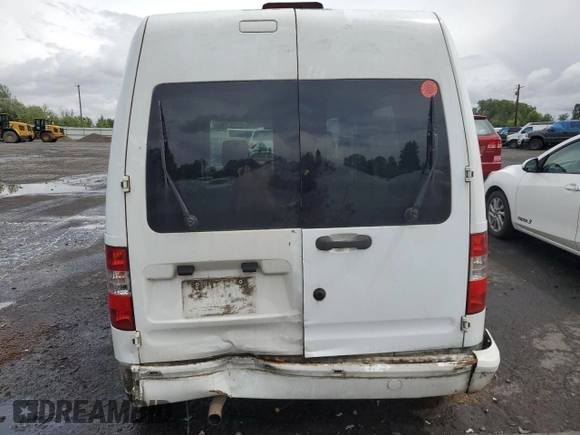 2010 Ford Transit Connect XLT with VIN NM0LS6BN1AT018703, listed as a Copart auction lot 56548575 with 184,017 mi miles and Salvage title. Bid and sale history available at DreamBid. Image 6.