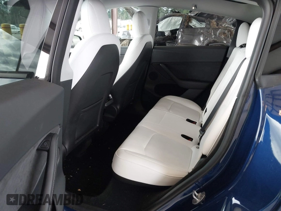 2023 Tesla Model Y Long Range with VIN 7SAYGDEEXPF621397, listed as a IAAI auction lot 41922714 with 29,460 mi miles. Bid and sale history available at carsss.com. Image 8.