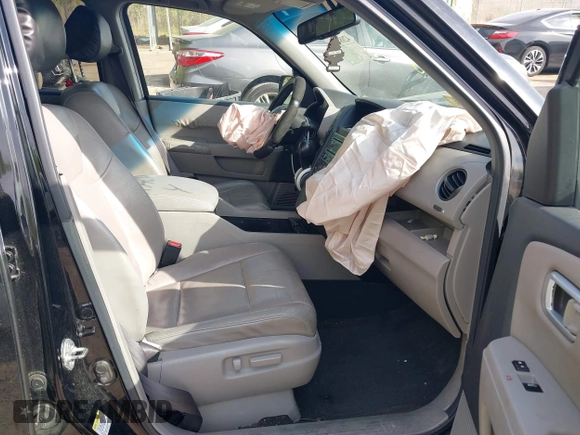 2011 Honda Pilot EX-L with VIN 5FNYF4H63BB004288, listed as a IAAI auction lot 42084984 with 215,019 mi miles and . Bid and sale history available at carsss.com. Image 5.