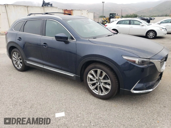 2017 Mazda CX-9 Grand Touring z VIN JM3TCADY3H0140573, wystawiony jako Copart lot #60513145 z przebiegiem 97 793 mil mil oraz Czysty tytuł • Clean title. Historia ofert i sprzedaży dostępna na DreamBid. Obrazek 4.