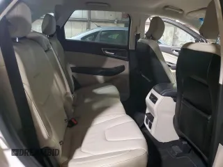 2015 Ford Edge Titanium z VIN 2FMTK3K91FBB08263, wystawiony jako Copart lot #55448405 z przebiegiem 135 788 mil mil oraz Szkoda całkowita • Salvage title. Historia ofert i sprzedaży dostępna na DreamBid. Obrazek 11.