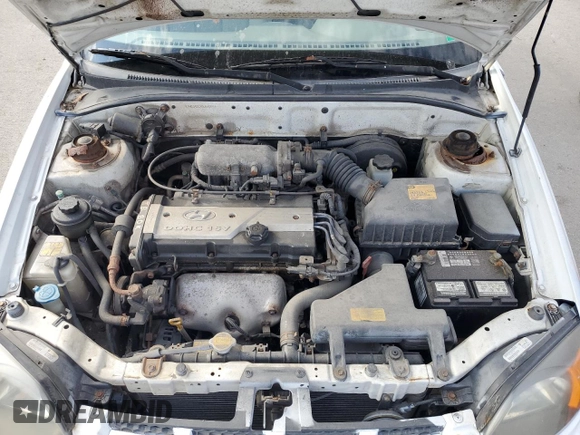 2005 Hyundai Accent GLS with VIN KMHCG45CX5U640554, listed as a Copart auction lot 77653664 with 179,642 mi miles and Clean Title. Bid and sale history available at carsss.com. Image 11.