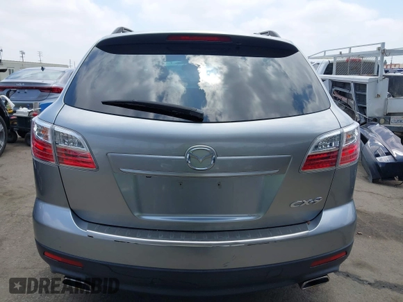 2011 Mazda CX-9 Grand Touring z VIN JM3TB2DA5B0319538, wystawiony jako IAAI lot #42429157 z przebiegiem 88 321 mil mil oraz . Historia ofert i sprzedaży dostępna na DreamBid. Obrazek 17.