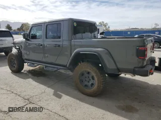 2023 Jeep Gladiator Mojave z VIN 1C6JJTEG7PL548084, wystawiony jako Copart lot #52827265 z przebiegiem 26 789 mil mil oraz Czysty tytuł • Clean title. Historia ofert i sprzedaży dostępna na DreamBid. Obrazek 2.
