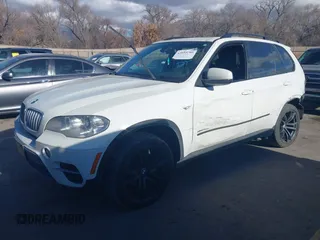 2012 BMW X5 35d with VIN 5UXZW0C56CL665631, listed as a IAAI auction lot 41055705 with 179,408 mi miles and . Bid and sale history available at DreamBid. Image 2.