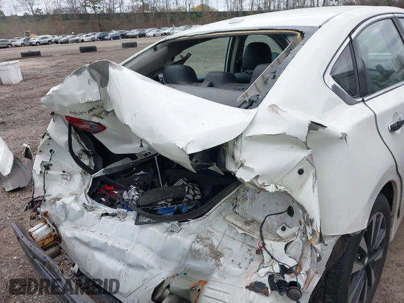 2018 Nissan Altima SR with VIN 1N4AL3AP7JC174856, listed as a IAAI auction lot 42070366 with 135,680 mi miles and . Bid and sale history available at carsss.com. Image 18.