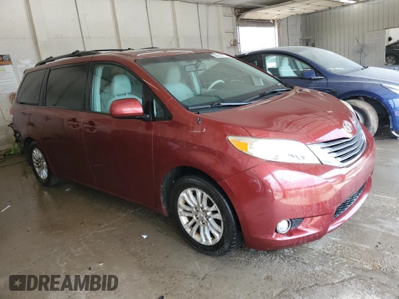 2011 Toyota Sienna XLE AAS with VIN 5TDYK3DC8BS024209, listed as a Copart auction lot 58923715 with 134,051 mi miles and Salvage title. Bid and sale history available at DreamBid. Image 4.