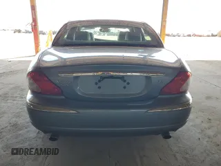 2004 Jaguar X-Type with VIN SAJEA51C14WE06627, listed as a Copart auction lot 54925735 with 107,756 mi miles and Clean Title. Bid and sale history available at DreamBid. Image 6.