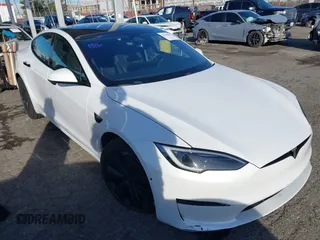 2022 Tesla Model S with VIN 5YJSA1E56NF493062, listed as a IAAI auction lot 41616427 with 41,874 mi miles and . Bid and sale history available at DreamBid. Image 1.