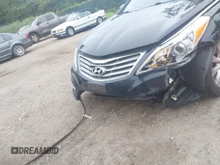 2013 Hyundai Azera with VIN KMHFH4JG5DA260461, listed as a IAAI auction lot 42603483 with 157,362 mi miles and . Bid and sale history available at DreamBid. Image 6.