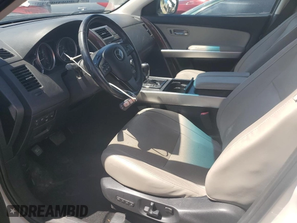 2015 Mazda CX-9 Grand Touring with VIN JM3TB3DA7F0454094, listed as a Copart auction lot 61757035 with 56,997 mi miles and Salvage title. Bid and sale history available at DreamBid. Image 7.