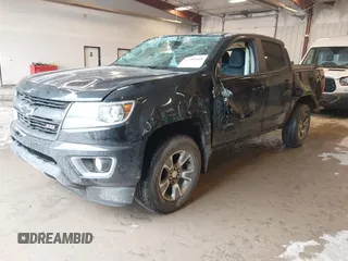 2019 Chevrolet Colorado 4WD Z71 with VIN 1GCGTDEN2K1121689, listed as a IAAI auction lot 42201118 with 96,351 mi miles and . Bid and sale history available at DreamBid. Image 2.