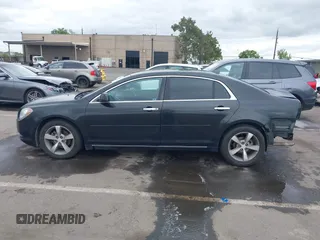 2012 Chevrolet Malibu 1LT with VIN 1G1ZC5E01CF381453, listed as a IAAI auction lot 42130929 with 157,721 mi miles and . Bid and sale history available at DreamBid. Image 14.