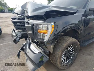 2023 Ford F-150 XL with VIN 1FTFW1E5XPFA81258, listed as a IAAI auction lot 42480441 with 34,950 mi miles and . Bid and sale history available at DreamBid. Image 18.