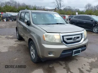 2009 Honda Pilot EX-L with VIN 5FNYF48569B002035, listed as a IAAI auction lot 41838347 with 198,849 mi miles. Bid and sale history available at carsss.com. Image 1.