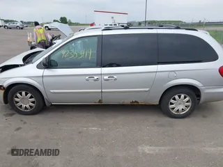 2006 Chrysler Town & Country Touring z VIN 2A4GP54L96R730719, wystawiony jako IAAI lot #42363419 z przebiegiem 186 173 mil mil oraz . Historia ofert i sprzedaży dostępna na DreamBid. Obrazek 14.