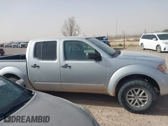2014 Nissan Frontier SV with VIN 1N6AD0ER0EN759772, listed as a IAAI auction lot 41479252 with 153,630 mi miles and . Bid and sale history available at DreamBid. Image 13.