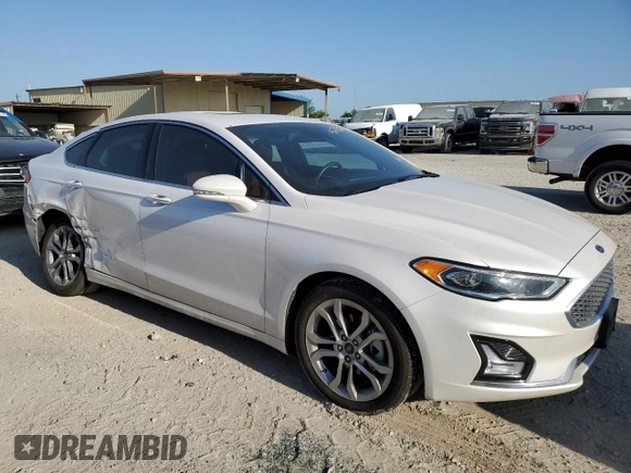 2020 Ford Fusion Titanium with VIN 3FA6P0RUXLR230201, listed as a Copart auction lot 52773875 with 72,788 mi miles and Salvage title. Bid and sale history available at DreamBid. Image 4.