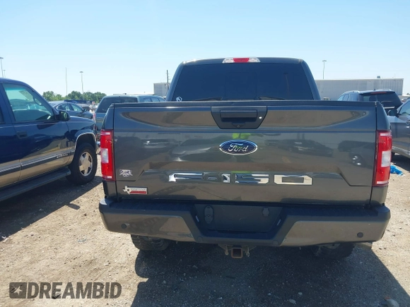 2020 Ford F-150 XL with VIN 1FTEW1E50LKE93170, listed as a IAAI auction lot 41918973 with 99,117 mi miles and . Bid and sale history available at carsss.com. Image 16.