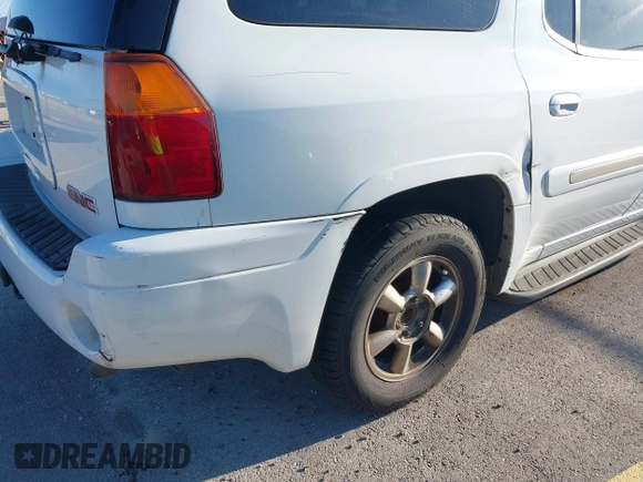 2003 GMC Envoy SLT with VIN 1GKES16S436243654, listed as a IAAI auction lot 42186690 with 125,315 mi miles and . Bid and sale history available at DreamBid. Image 14.