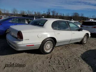 1997 Chrysler LHS z VIN 2C3HC56F2VH756214, wystawiony jako Copart lot #80987184 z przebiegiem 97 256 mil mil oraz Szkody całkowita. Historia ofert i sprzedaży dostępna na DreamBid. Obrazek 3.