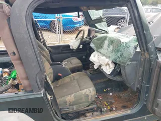 2004 Jeep Wrangler X z VIN 1J4FA39S84P714902, wystawiony jako IAAI lot #42459287 z przebiegiem Nie podano mil oraz . Historia ofert i sprzedaży dostępna na DreamBid. Obrazek 5.