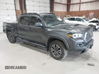 2020 Toyota Tacoma SR5 with VIN 3TMDZ5BN5LM087084, listed as a IAAI auction lot 42108047 with 142,345 mi miles and . Bid and sale history available at DreamBid. Image 1.