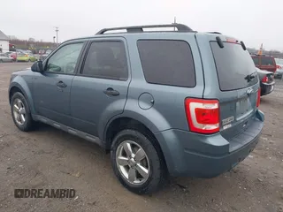 2010 Ford Escape XLT with VIN 1FMCU9D77AKD37005, listed as a IAAI auction lot 41948357 with 305,650 mi miles. Bid and sale history available at carsss.com. Image 3.