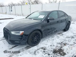 2014 Audi S4 Premium Plus with VIN WAUDGAFL2EA145267, listed as a IAAI auction lot 41127787 with 124,844 mi miles. Bid and sale history available at carsss.com. Image 2.