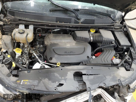 2023 Chrysler Pacifica Touring L with VIN 2C4RC1BG3PR582271, listed as a Copart auction lot 51644595 with 57,930 mi miles and Salvage title. Bid and sale history available at DreamBid. Image 12.