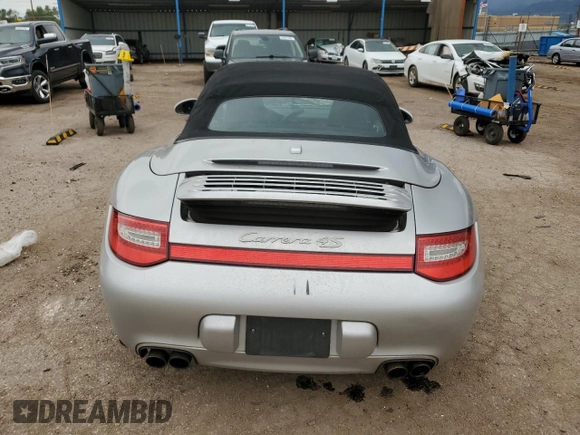 2009 Porsche 911 Carrera S with VIN WP0CB29919S755552, listed as a Copart auction lot 59403325 with 57,990 mi miles and Salvage title. Bid and sale history available at DreamBid. Image 6.