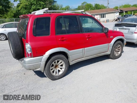 2005 Suzuki Grand Vitara LX with VIN JS3TD62VX54201211, listed as a IAAI auction lot 42220221 with 242,165 mi miles and . Bid and sale history available at DreamBid. Image 4.