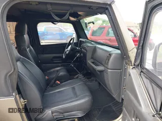 2003 Jeep Wrangler SE with VIN 1J4FA29193P302424, listed as a IAAI auction lot 42179494 with 120,712 mi miles and . Bid and sale history available at DreamBid. Image 5.