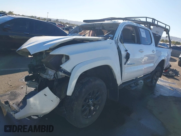 2022 Toyota Tacoma SR with VIN 3TMCZ5AN3NM456220, listed as a IAAI auction lot 41286882 with Not provided miles and . Bid and sale history available at DreamBid. Image 18.