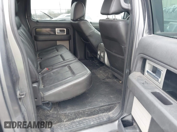 2011 Ford F-150 XLT with VIN 1FTFW1ET4BFC23725, listed as a IAAI auction lot 42018932 with 323,160 mi miles. Bid and sale history available at carsss.com. Image 8.