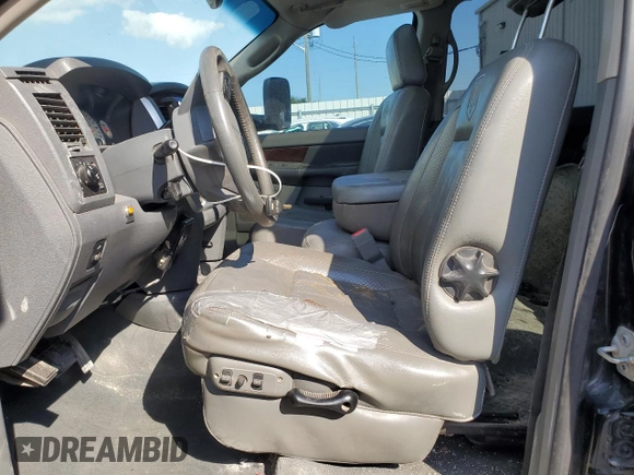 2008 Dodge 3500 Laramie z VIN 3D3MX49A98G105344, wystawiony jako Copart lot #74003044 z przebiegiem 183 844 mil mil oraz Szkoda całkowita • Salvage title. Historia ofert i sprzedaży dostępna na DreamBid. Obrazek 7.