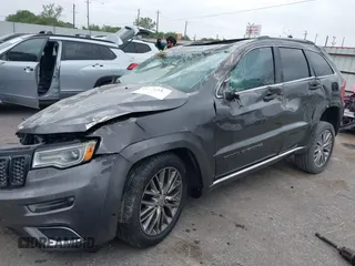 2018 Jeep Grand Cherokee Summit with VIN 1C4RJFJT1JC370907, listed as a IAAI auction lot 41944933 with 110,597 mi miles and . Bid and sale history available at DreamBid. Image 2.