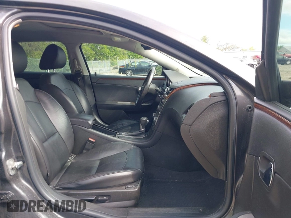 2012 Chevrolet Malibu LTZ with VIN 1G1ZG5E74CF297032, listed as a IAAI auction lot 42133482 with 82,682 mi miles and . Bid and sale history available at DreamBid. Image 5.