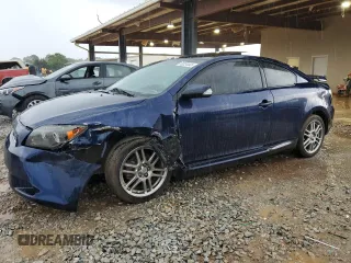 2007 Scion tC Spec z VIN JTKDE177570183040, wystawiony jako Copart lot #55234445 z przebiegiem 228 977 mil mil oraz Szkoda całkowita • Salvage title. Historia ofert i sprzedaży dostępna na DreamBid. Obrazek 1.