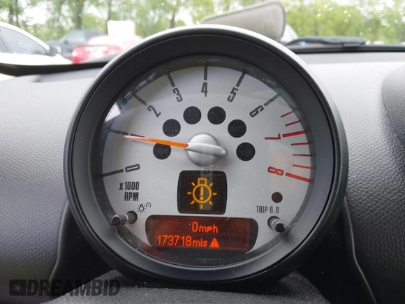 2011 MINI Countryman S with VIN WMWZC5C53BWM11022, listed as a IAAI auction lot 42249403 with 173,718 mi miles and . Bid and sale history available at DreamBid. Image 7.