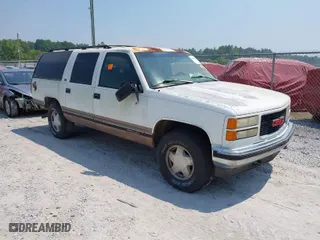 1996 GMC Suburban with VIN 1GKFK16R3TJ726521, listed as a IAAI auction lot 42055945 with 170,893 mi miles. Bid and sale history available at carsss.com. Image 1.