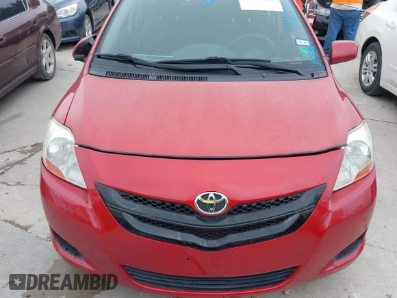 2007 Toyota Yaris with VIN JTDBT903071077664, listed as a IAAI auction lot 42175827 with 154,079 mi miles. Bid and sale history available at carsss.com. Image 10.