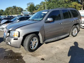 2006 GMC Envoy Denali with VIN 1GKES63M962257466, listed as a Copart auction lot 76821124 with 171,266 mi miles and Salvage Title. Bid and sale history available at carsss.com. Image 1.