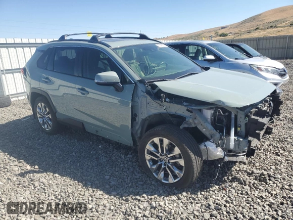 2021 Toyota RAV4 XLE Premium with VIN JTMA1RFV4MD070219, listed as a Copart auction lot 69473604 with 39,914 mi miles and Salvage title. Bid and sale history available at DreamBid. Image 4.