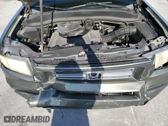 2006 Honda Ridgeline RTS z VIN 2HJYK16496H511588, wystawiony jako Copart lot #58240785 z przebiegiem 197 639 mil mil oraz Szkoda całkowita • Salvage title. Historia ofert i sprzedaży dostępna na DreamBid. Obrazek 11.