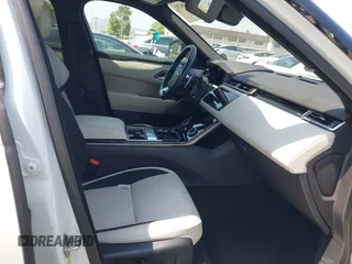2018 Land Rover Range Rover Velar R-Dynamic SE z VIN SALYL2RX1JA747276, wystawiony jako IAAI lot #42466282 z przebiegiem 51 011 mil mil oraz . Historia ofert i sprzedaży dostępna na DreamBid. Obrazek 5.